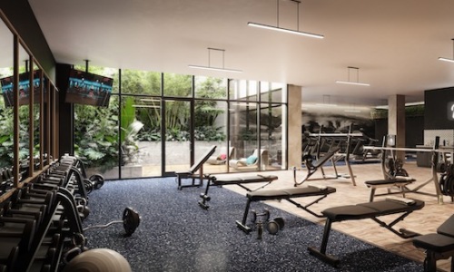 Large well lit fitness center 